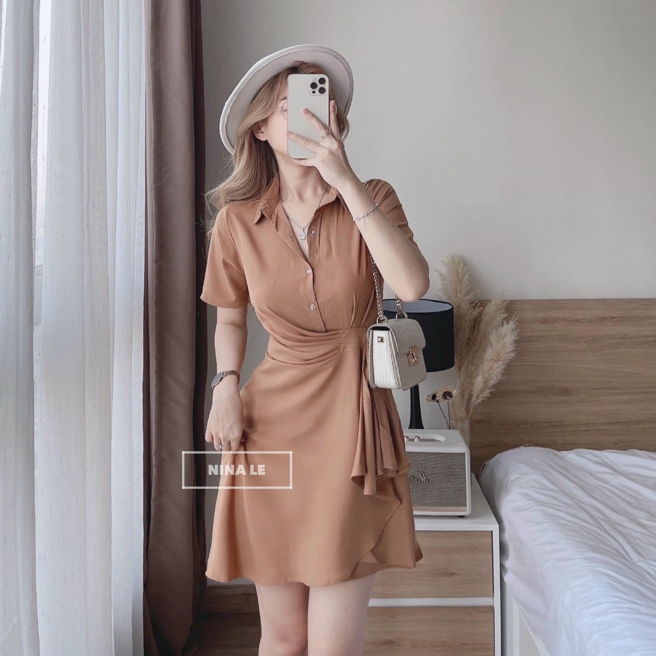 Đầm nữ - chất liệu đủi - thiết kế kiểu dáng nhẹ nhàng , đơn giản