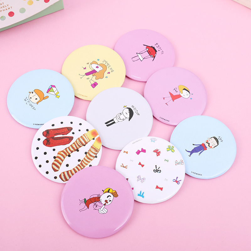 Gương trang điểm mini cầm tay