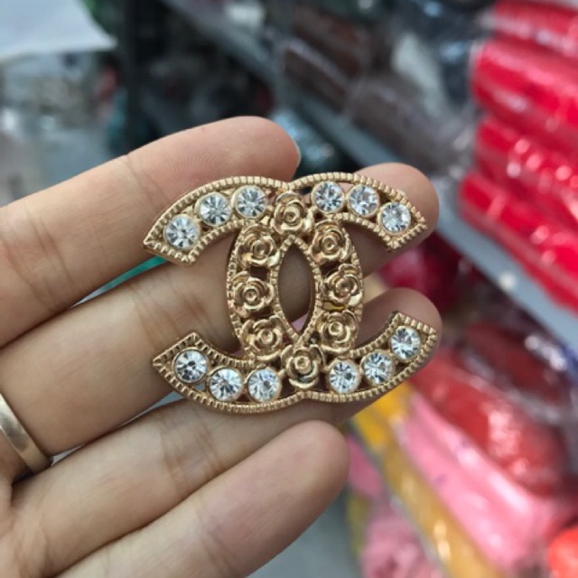 mạc chữ X trang trí túi xách 12k/cái