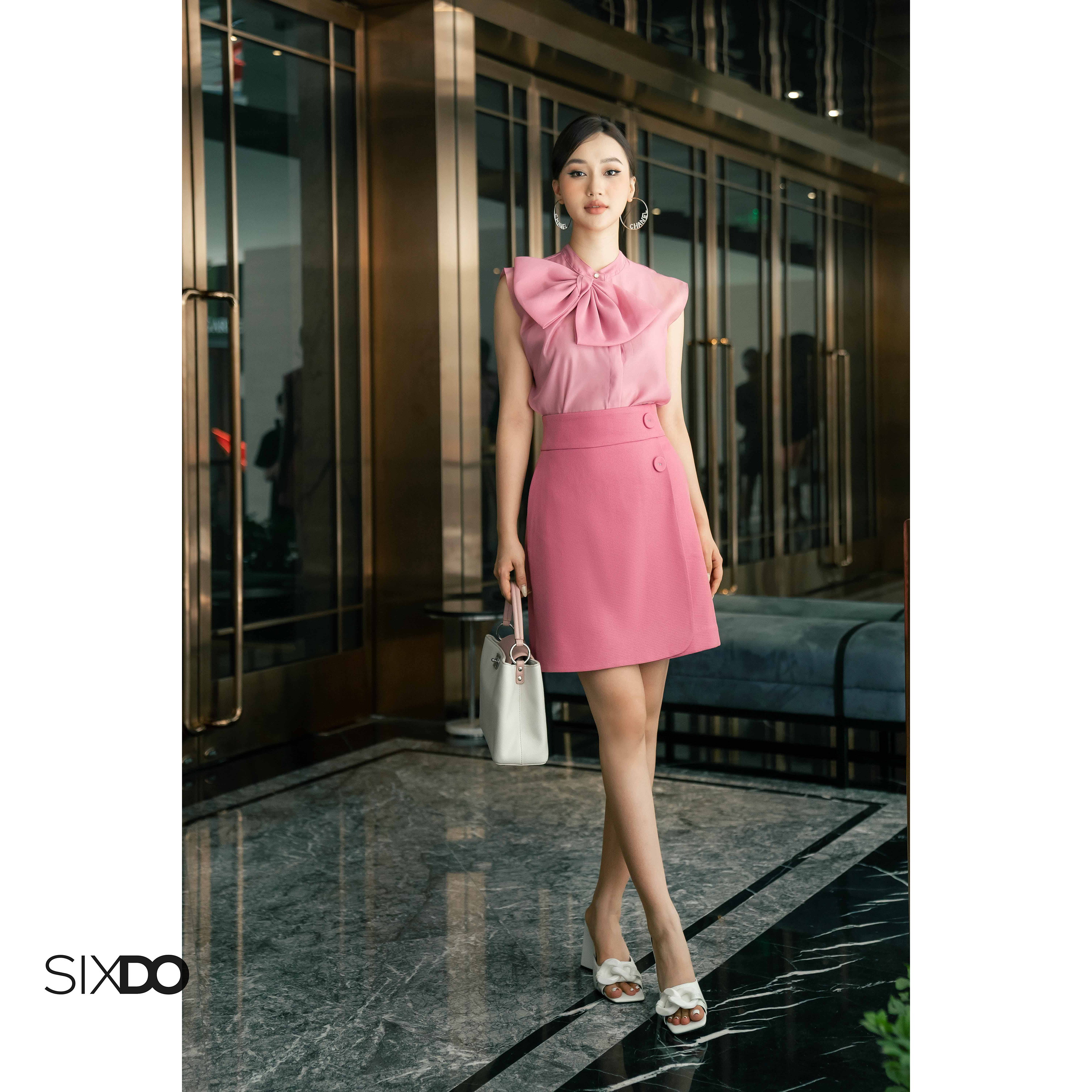 Chân váy hồng phối cúc cạnh SIXDO
