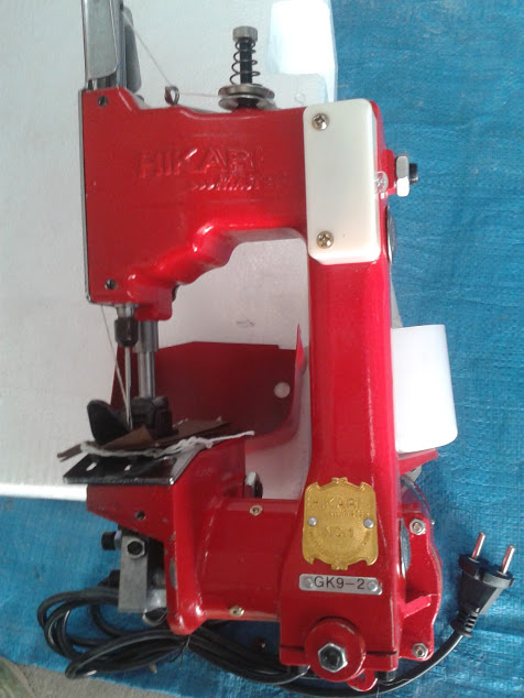 Máy khâu bao bì cầm tay  Gk9-2 Hikari, madein Thái lan loại 100W màu đỏ