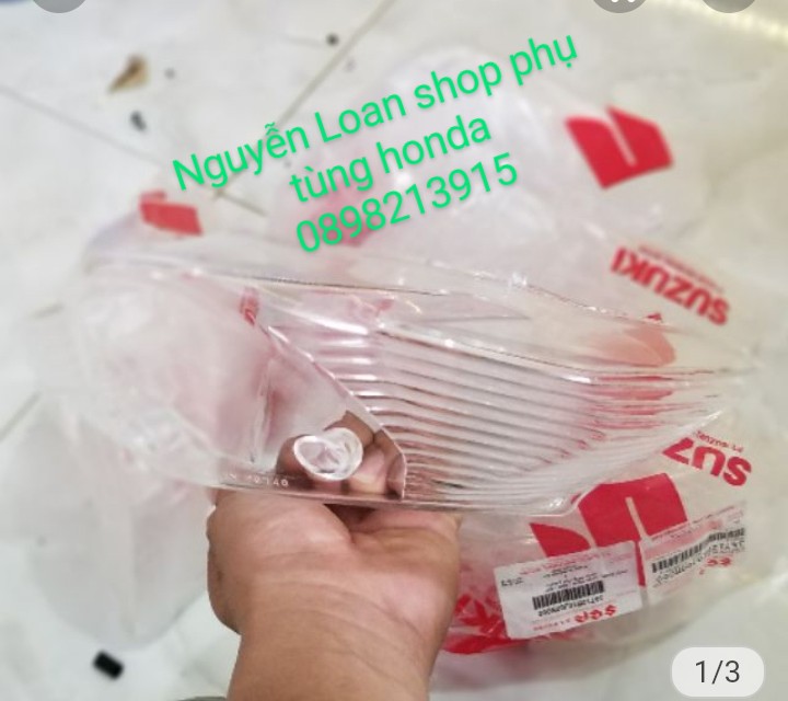 Mica đèn hậu Suzuki Axelo zin