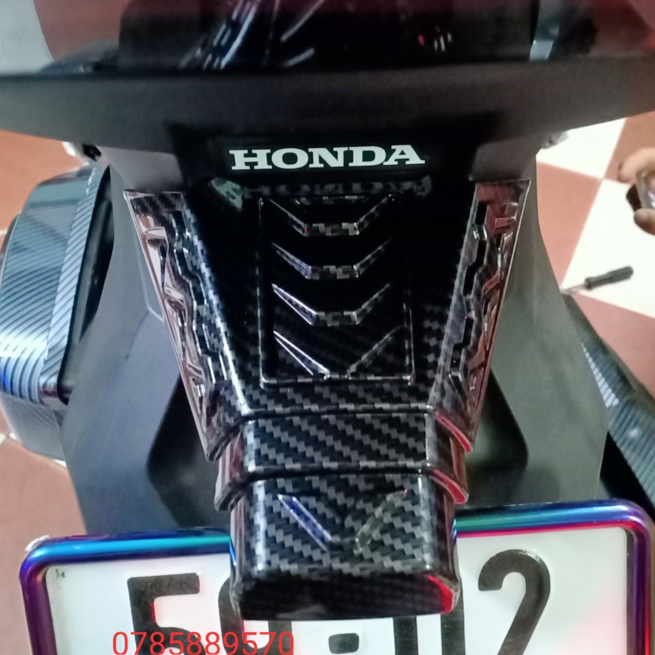 ỐP CÓC ĐÈN XE AIR BLADE 2020-2023 CARBON