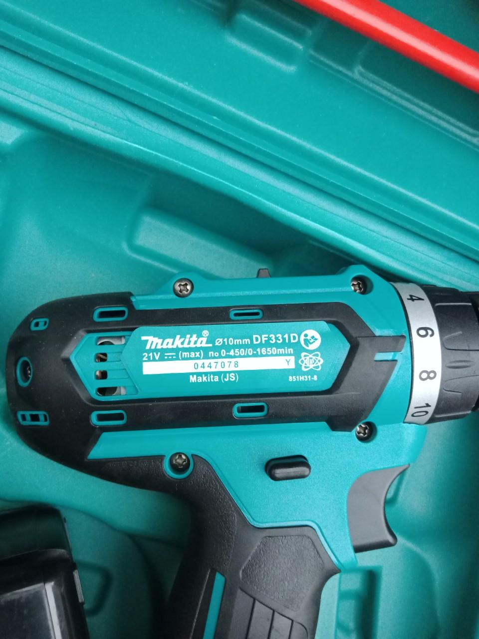 Máy khoan pin 21v  Makita DF331d loai 1