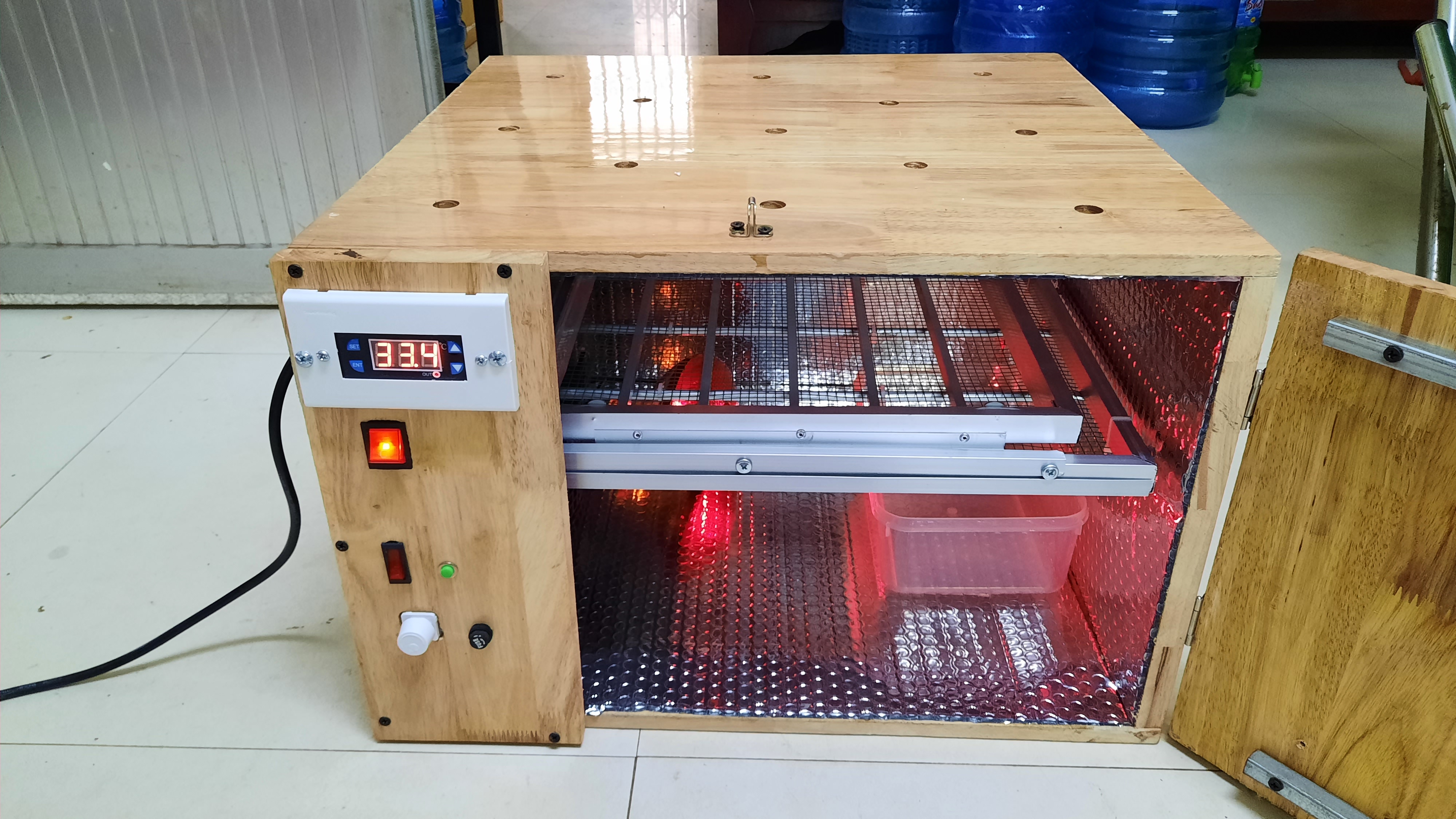 MÁY ẤP 50 TRỨNG TỰ ĐỘNG THÙNG GỔ CÓ SƠN PU