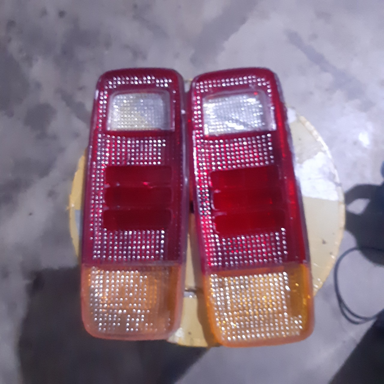 Nắp đèn hậu kia 1.4 tấn