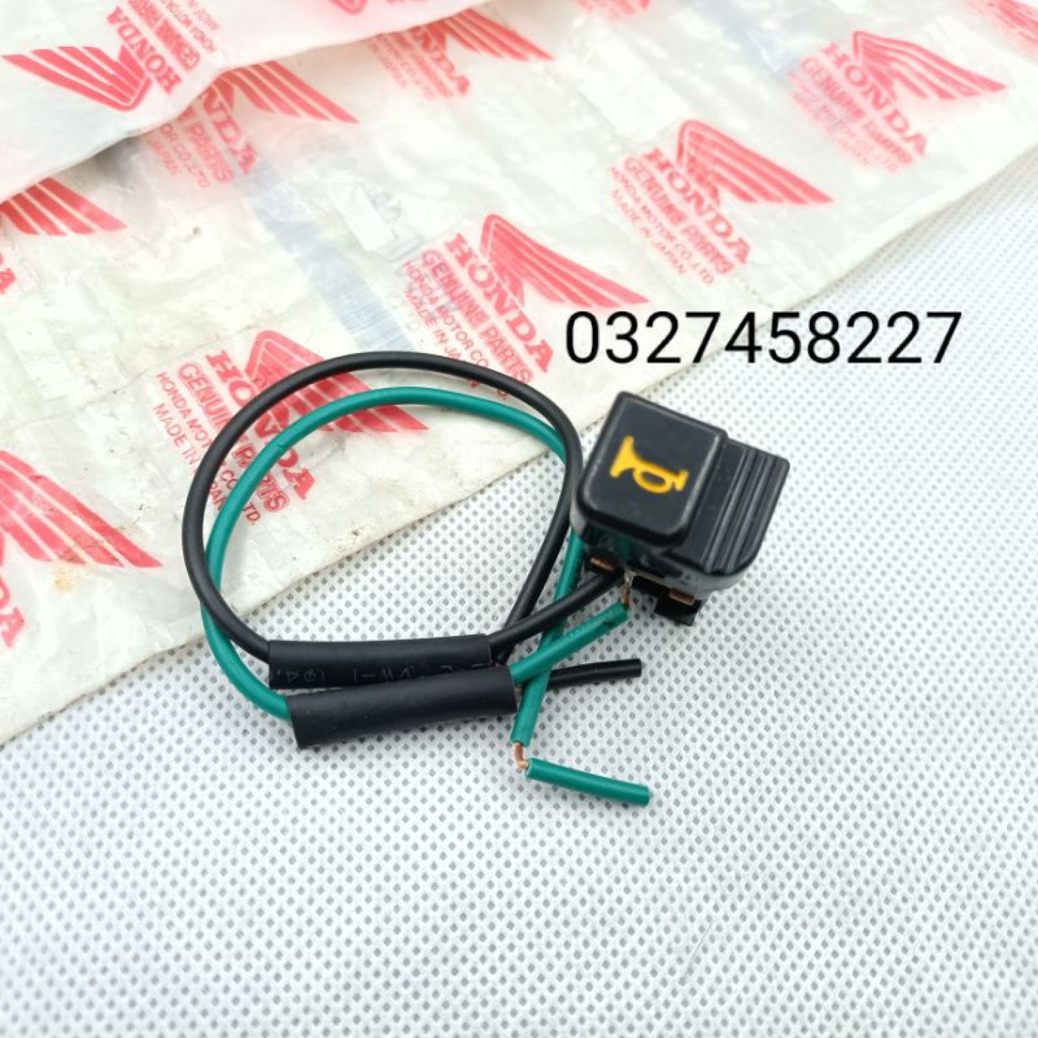 Nút bấm công tắt còi, kèn xe DREAM thái zin Honda