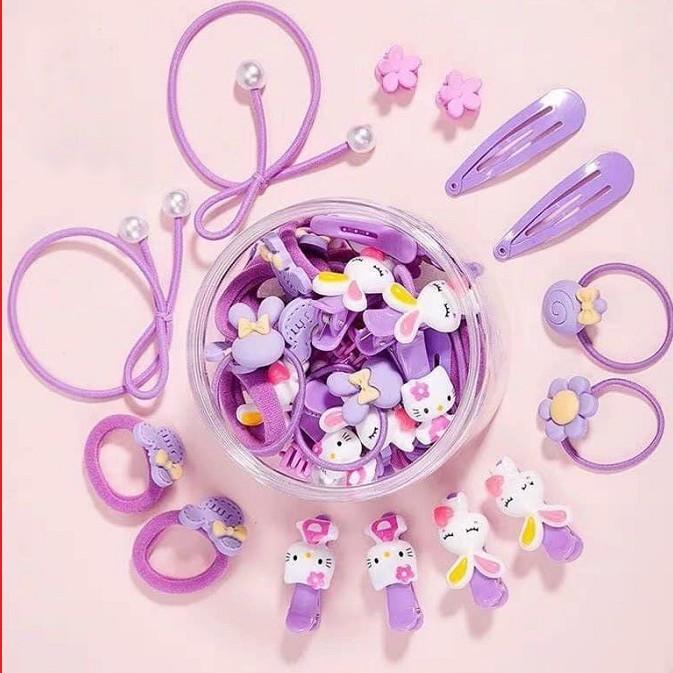 Hộp 50 dây buộc tóc + kẹp tóc đính nơ dễ thương cho bé (hộp nhựa tròn, giao màu ngẫu nhiên)