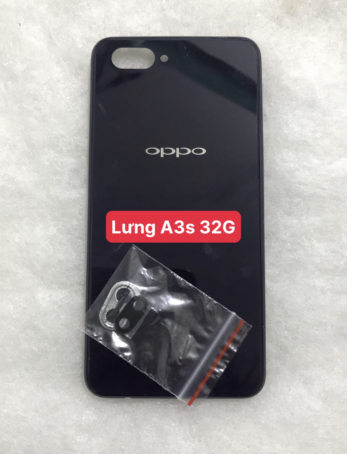 Nắp Lưng Oppo A3s 32G ( bản có lỗ trọc sim phía trên)