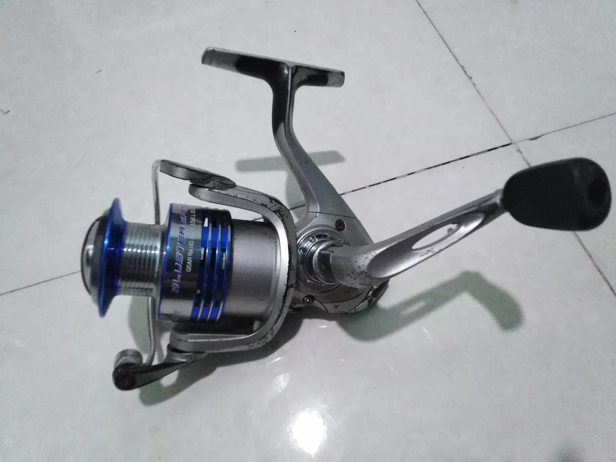 Máy câu bãi nhật Bluster spin 3000 cối kim loại