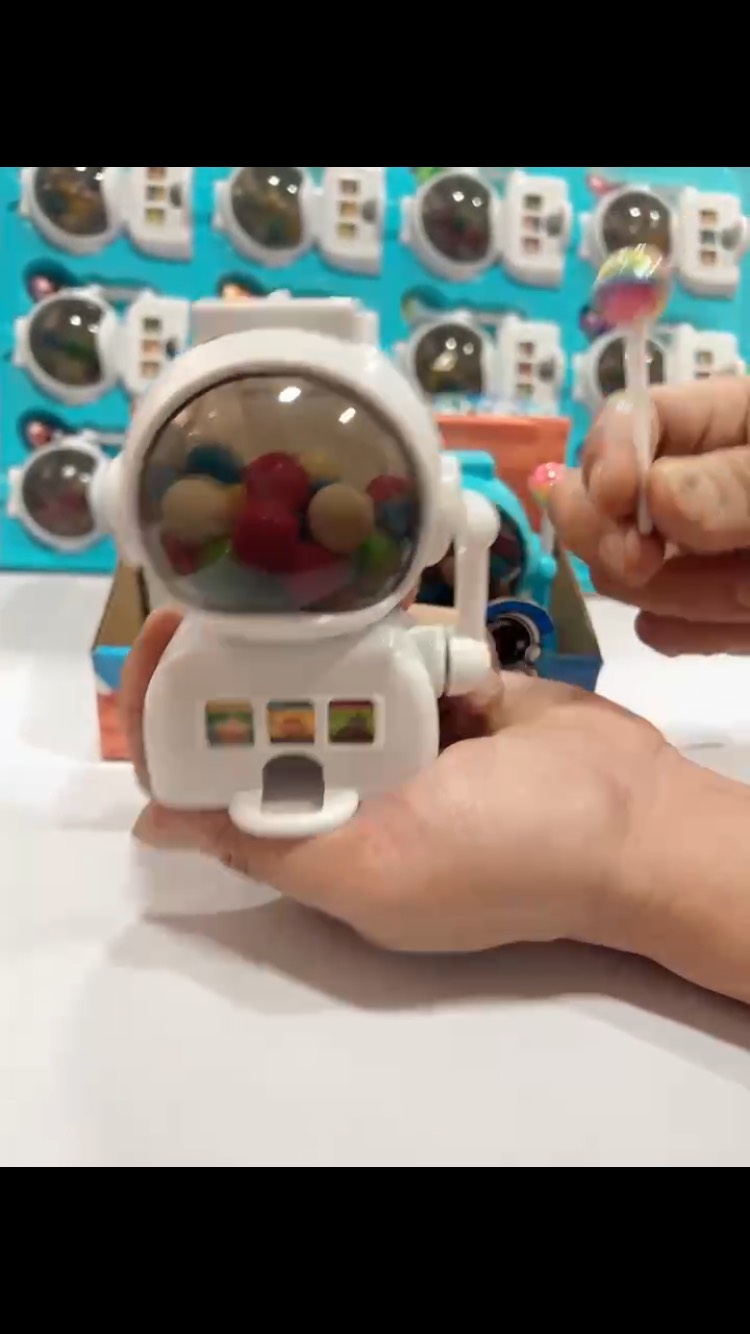 Máy bán kẹo phi hành gia Astronaut candy machine kèm kẹo mút 1 chiếc