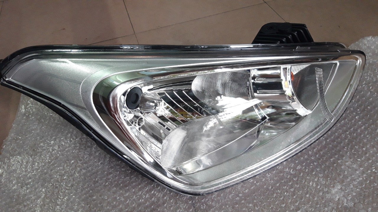 Đèn pha Grand I10 (Có dù che bóng đèn, Phân vế ) OEM
