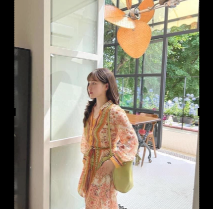 Váy cam họa tiết thuylinh
