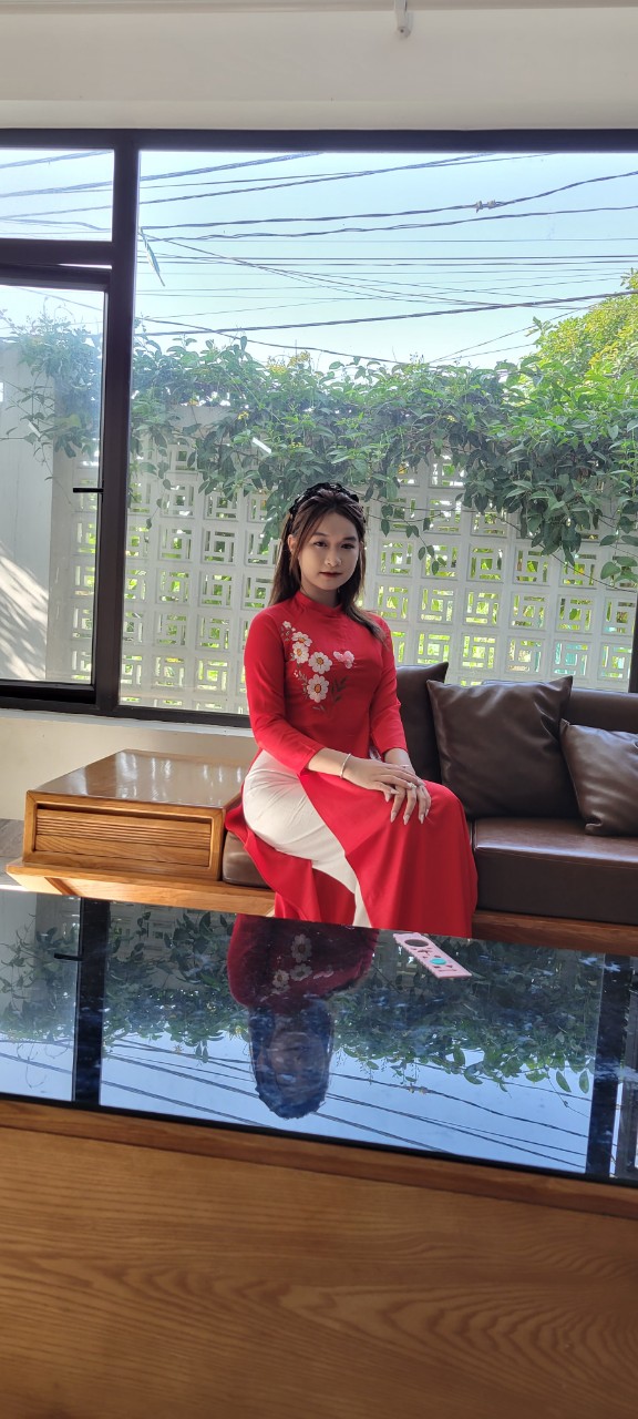 áo dài thêu tây thi