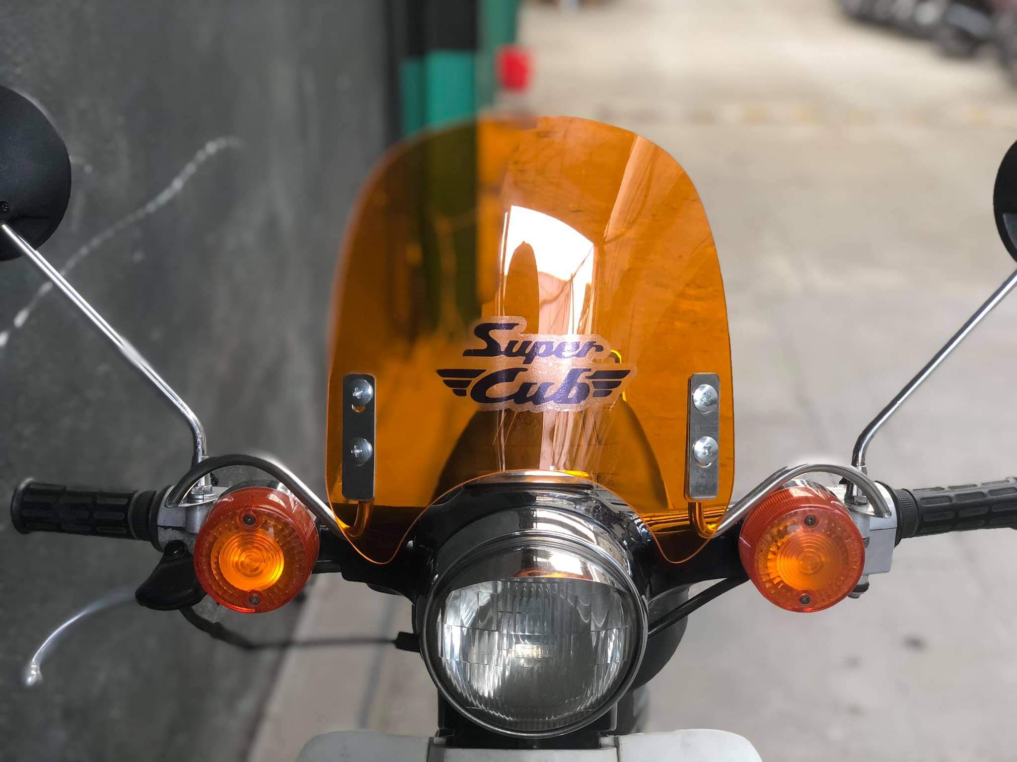 Kính chắn gió xe cub đèn tròn Takegawa