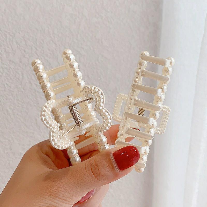 KẸP GẤP TÓC NGỌC TRAI THANH LỊCH