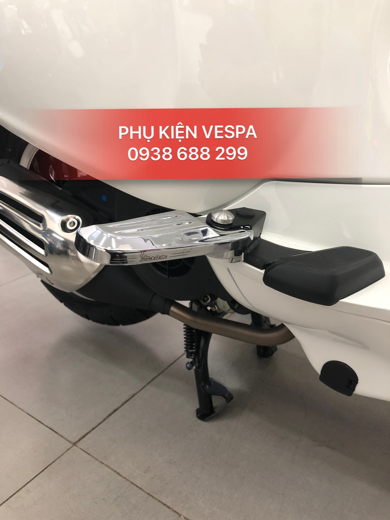 [HCM]gác chân vespa có nút bấm