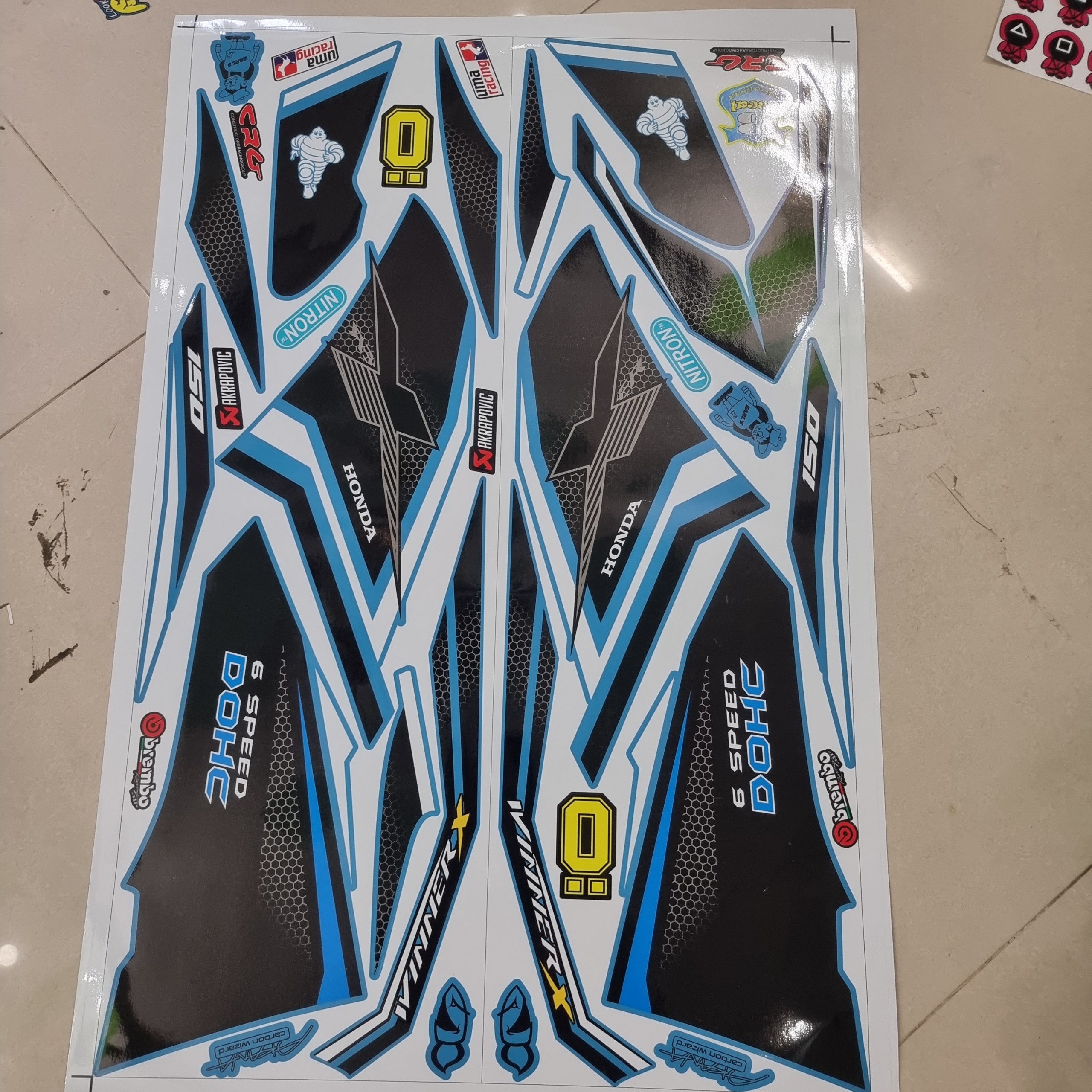 Tem xe winner x tổ ong chữ X tặng logo