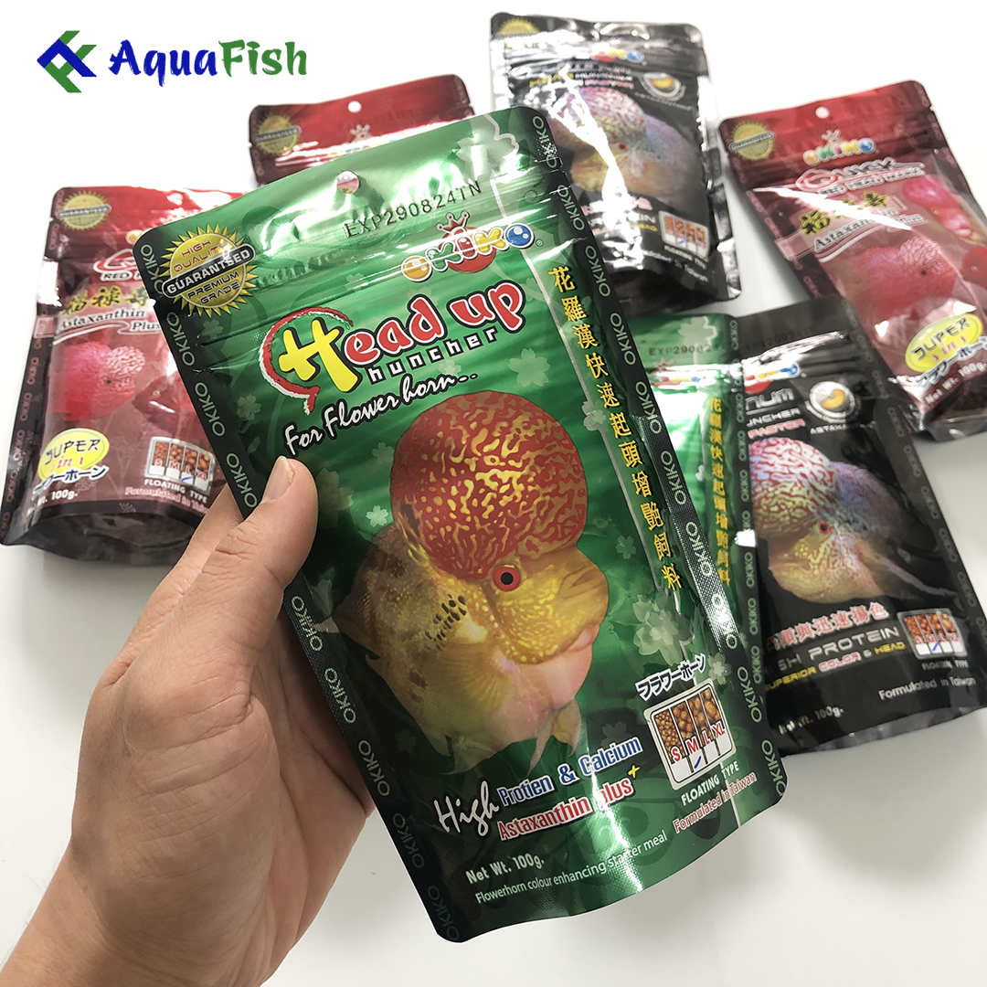 Thức ăn cho cá La Hán Okiko 100g giúp cá nhanh lớn, phát triển đầu và lên màu sắc đẹp