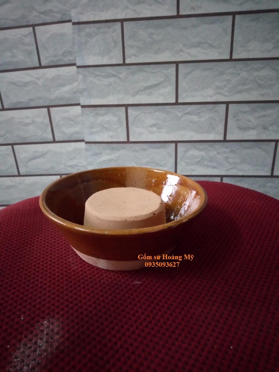 Chén kê chân tủ 4 chén