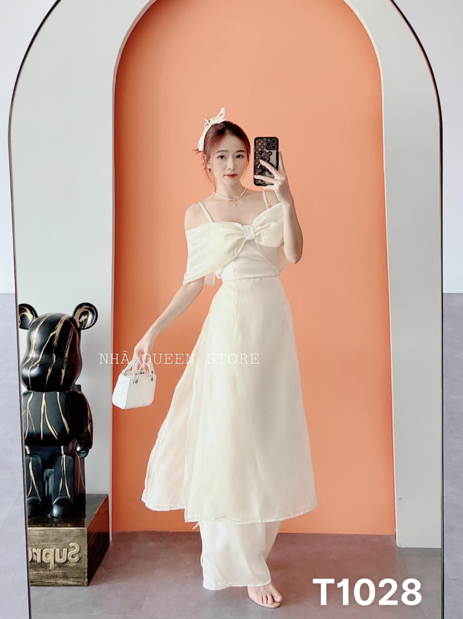 Áo dài nữ cách tân trể vai 2 dây phố nơ chất liệu voan lụa T1028
