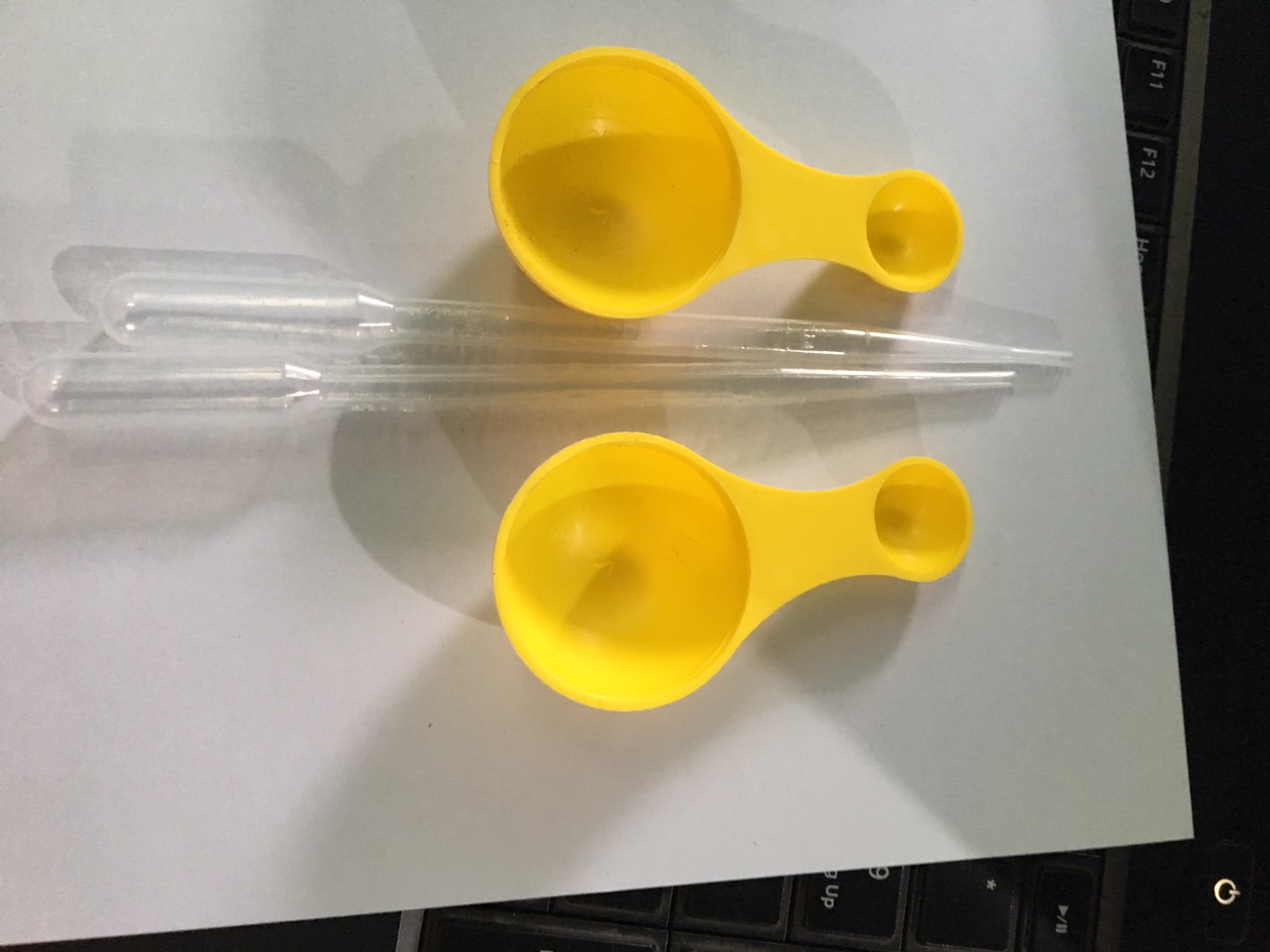 dụng cụ định lượng chăm sóc hoa lan 02 ống và 02 muỗng