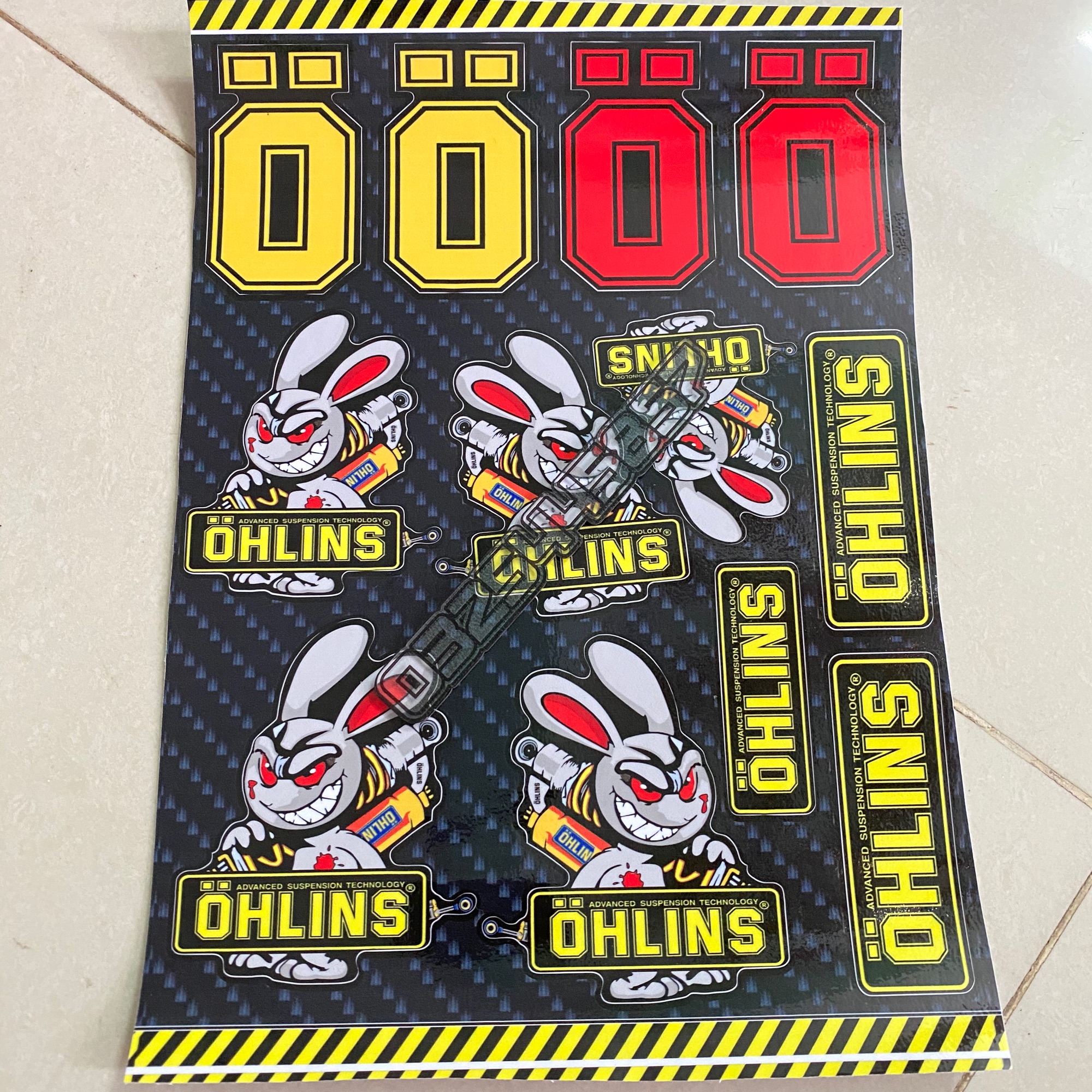logo sticker chữ O con thỏ cầm phuộc