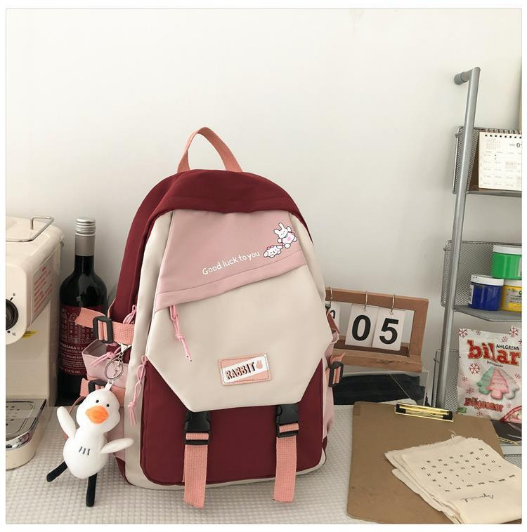 Balo Guofei trơn vải chống thấm phối màu tặng móc khóa vịt bông