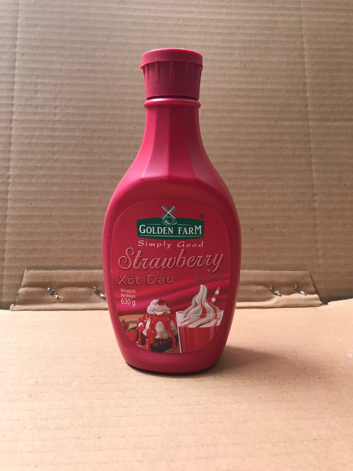 Sốt dâu golden farm chai 630g