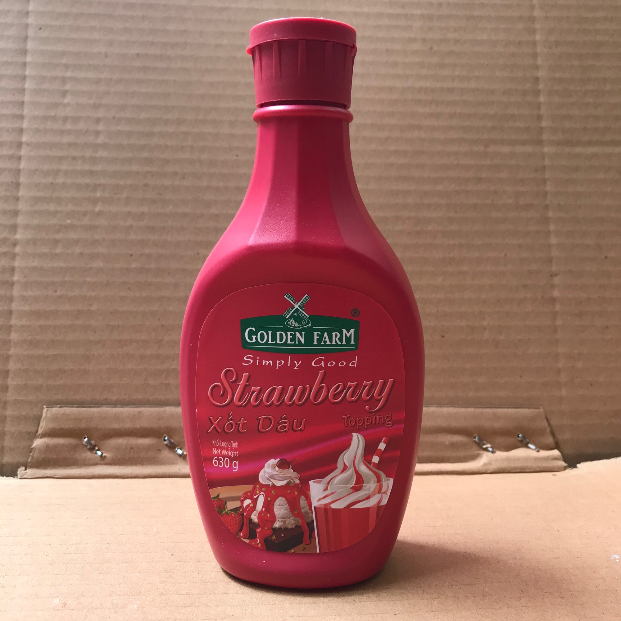 Sốt dâu golden farm chai 630g