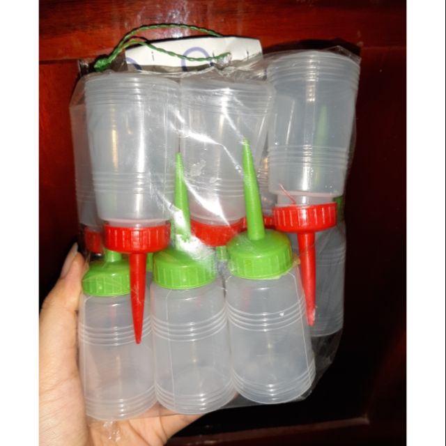 Lốc 12 chai chiết nhựa loại trung 50ml chiết keo sữa , chất lỏng ....