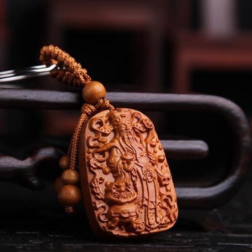 Móc khóa gỗ thủ công khắc hình thần tài may mắn