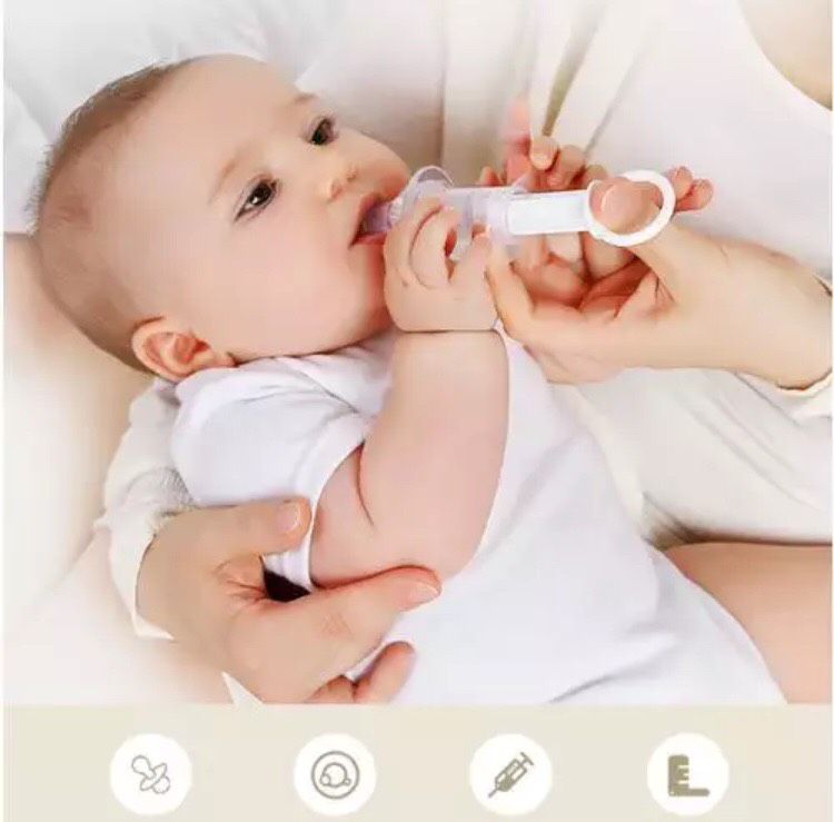 Dụng cụ bơm sữa bón sữa cho bé