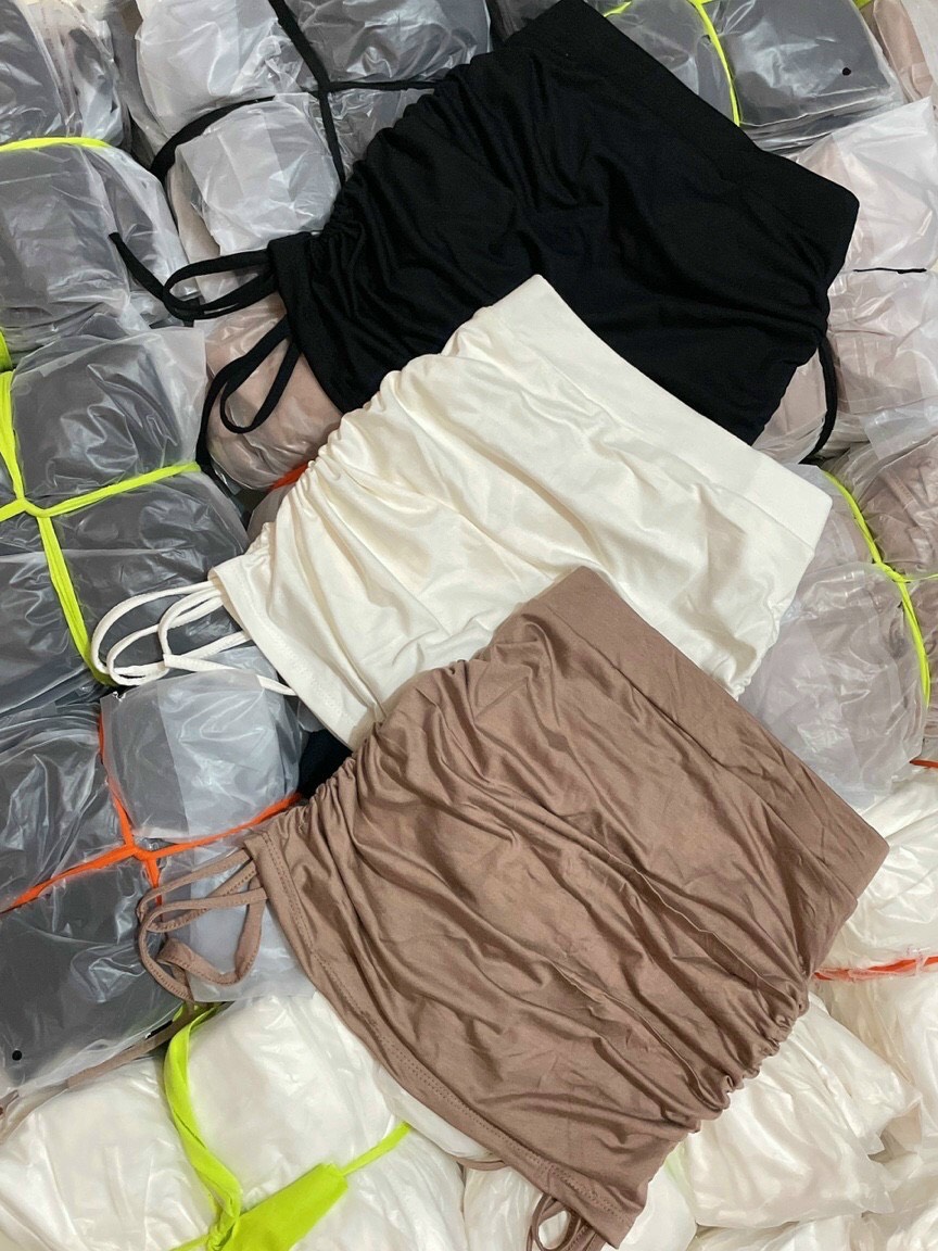 chân váy rút dây 2 bên lưng thun cực xinh , chất thun bozip mềm mịn kèm lót