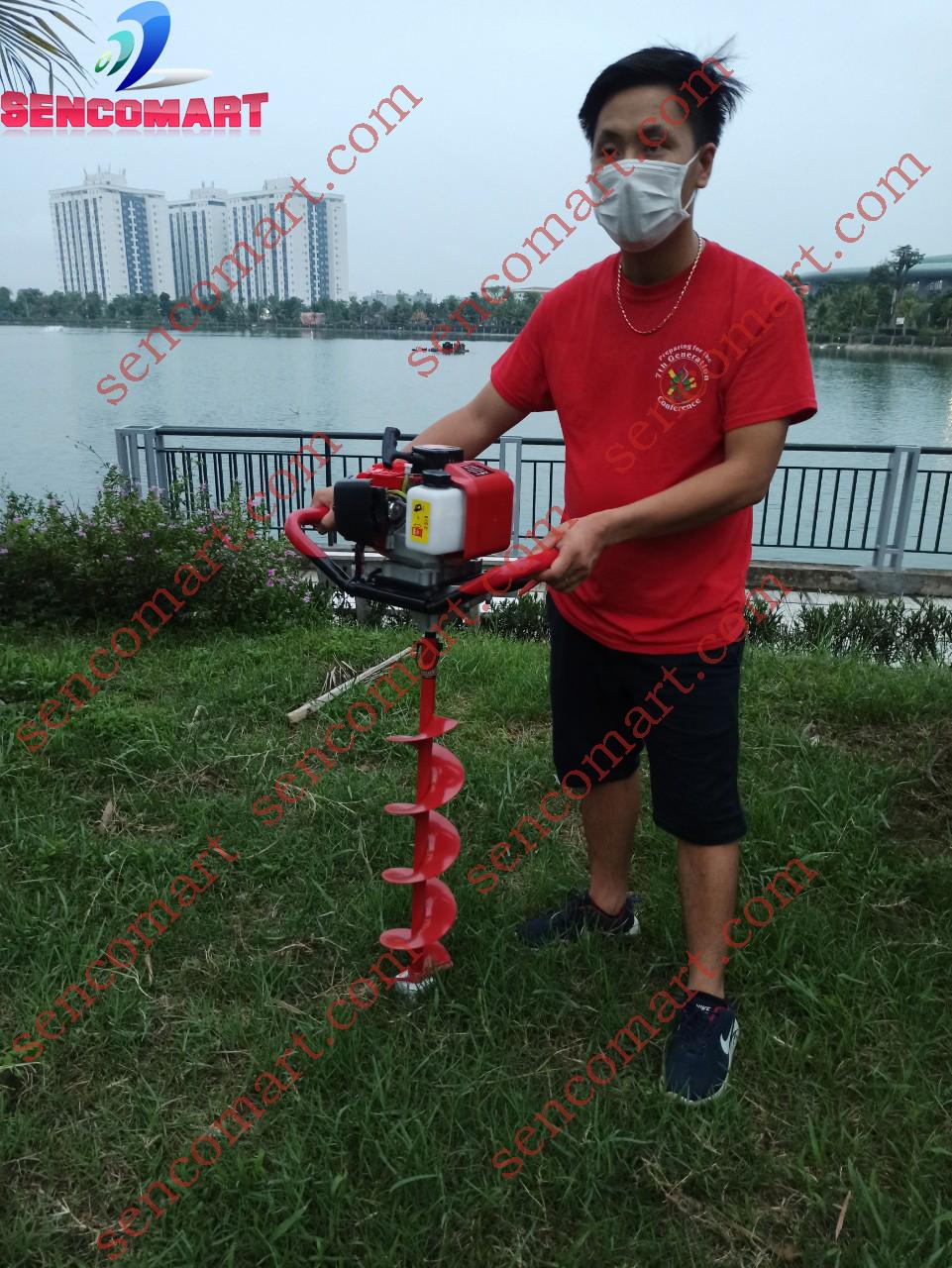 Máy khoan đất oshima 2p tặng mũi khoan ( 1 trong mũi 100, 150mm)