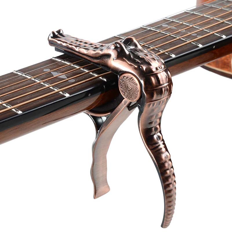 Kẹp capo guitar cá sấu Alice A007G/BR