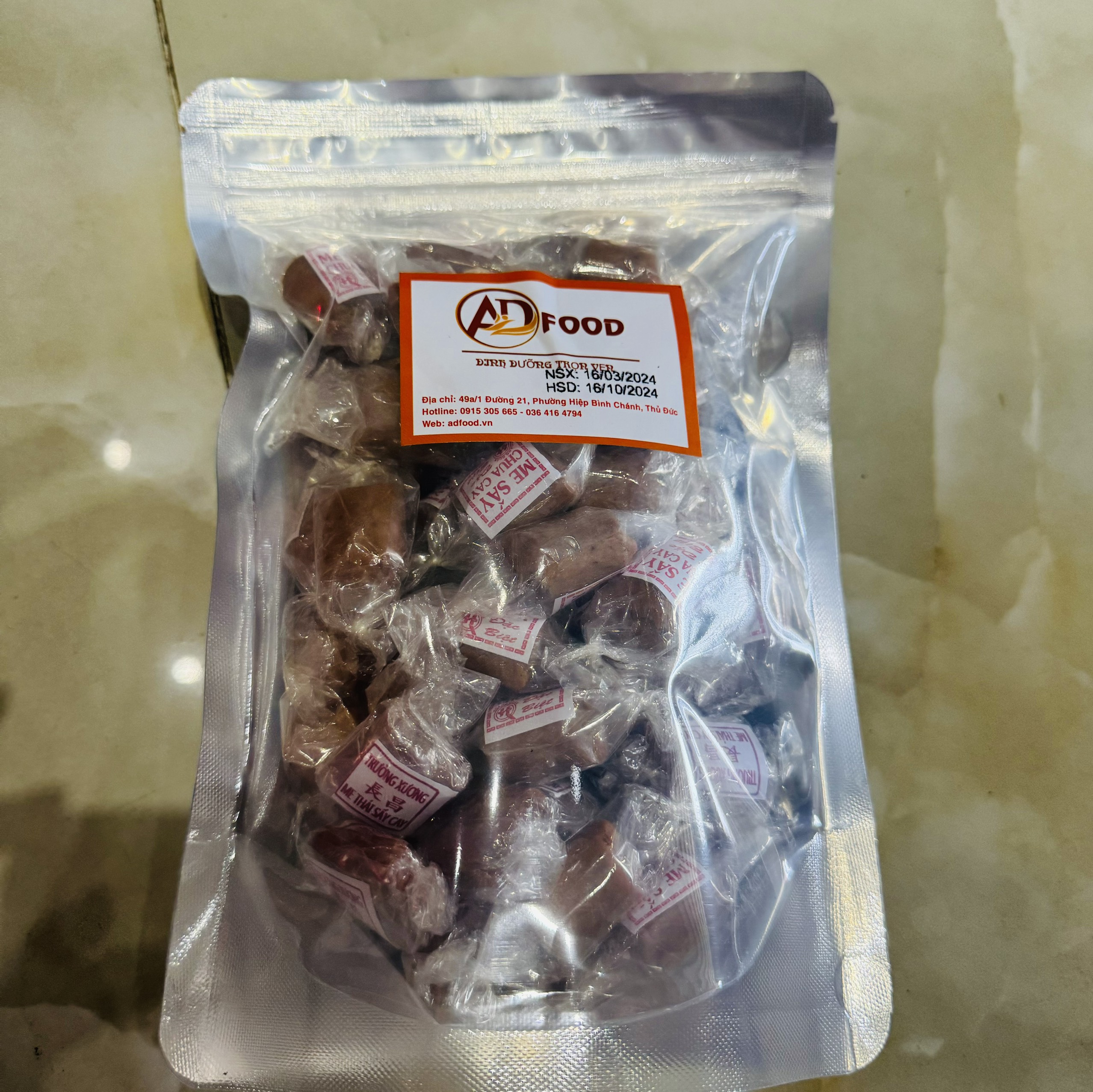 gói kẹo me sấy chua cay 100g
