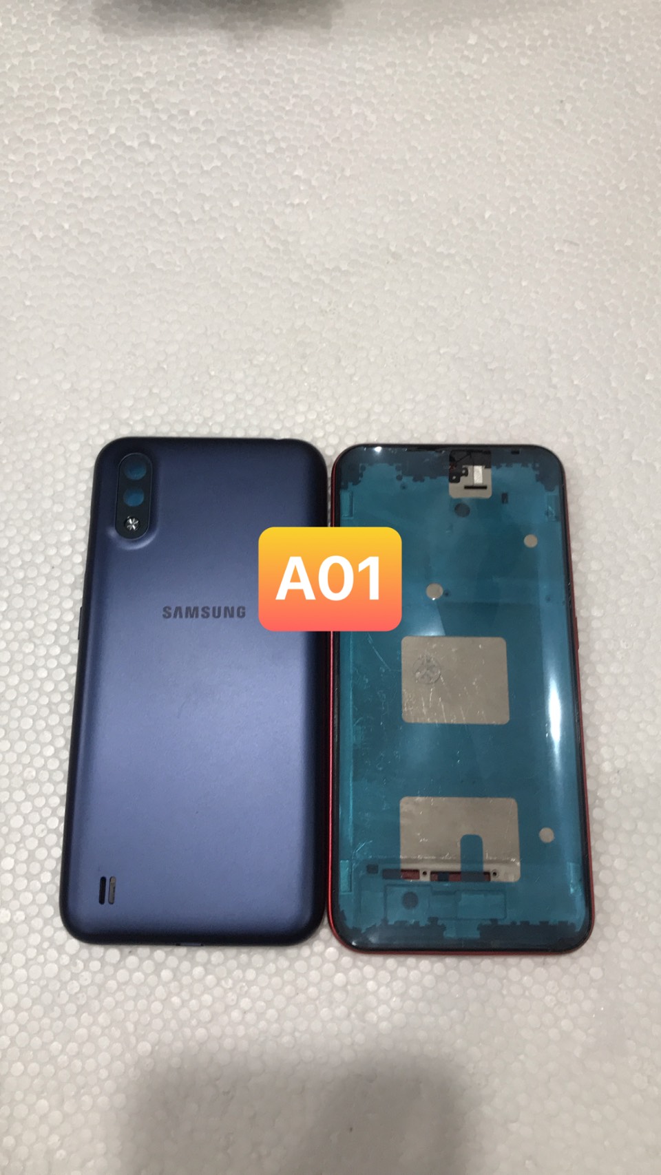 bộ vỏ a01 -samsung ( gồm sườn.lưng phím, kính cam)