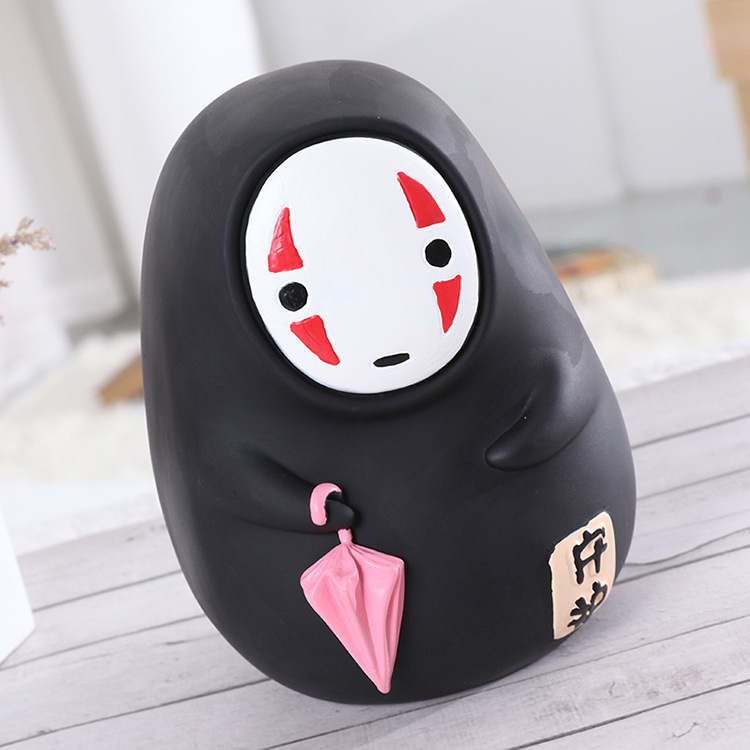Ống tiết kiệm vô diện 02 cầm dù trang trí qùa tặng