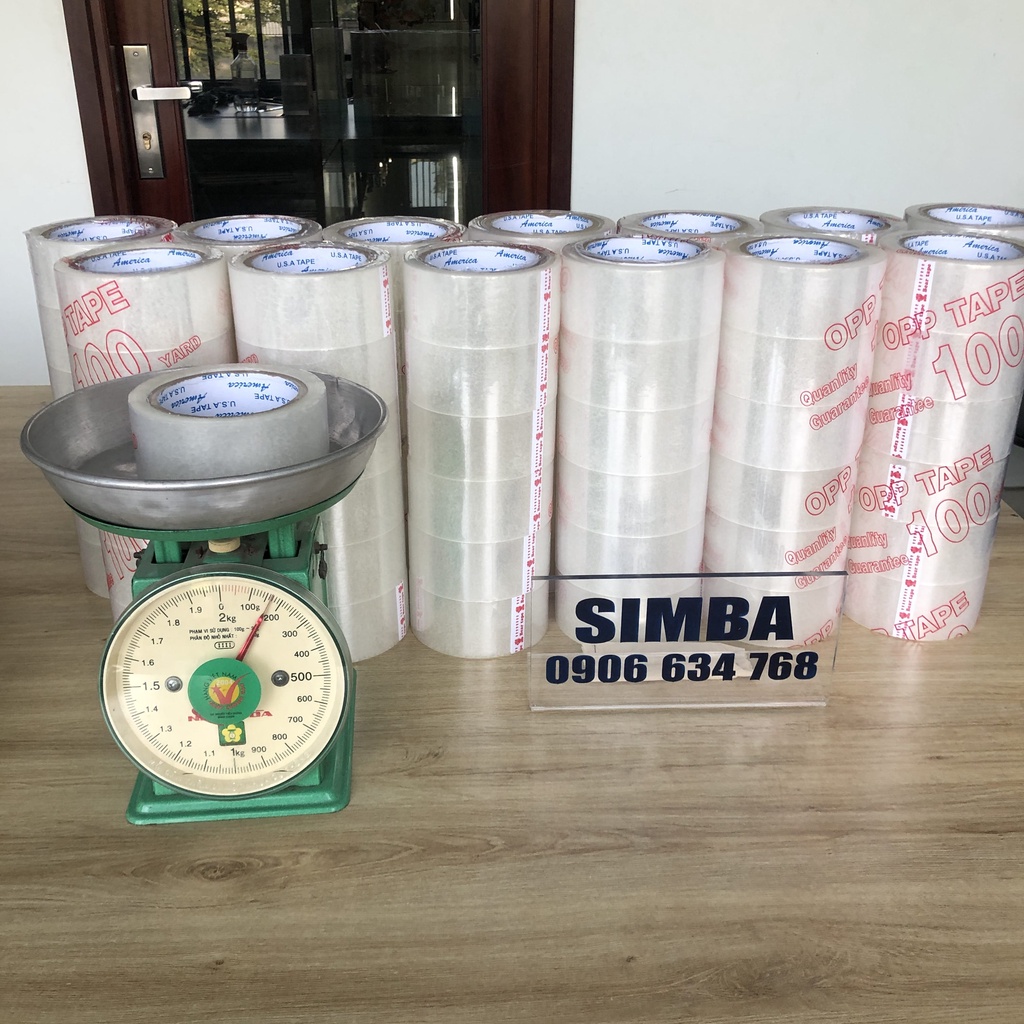 1 cuộn Băng keo  trong  100Yard lõi mỏng 5ly (1 kg /cây )