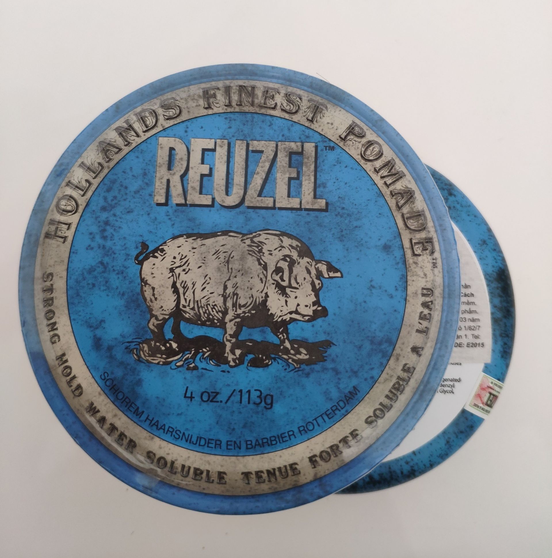 Sáp vuốt tóc Reuzel Blue Pomade chính hãng
