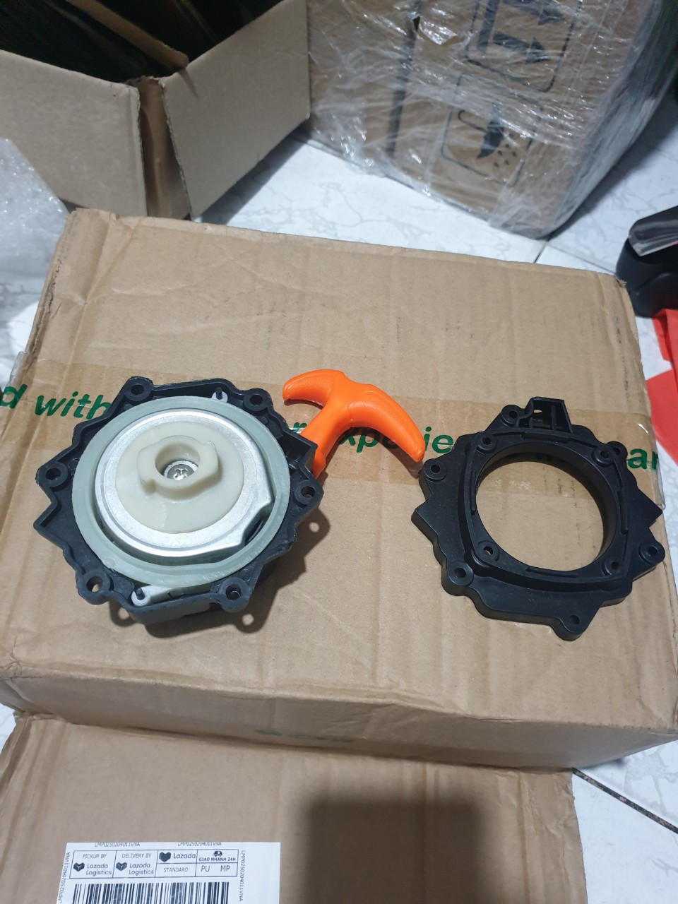 Bộ chụp giật ( khởi động) máy cắt cỏ 260 trợ lực ( 4 ốc - 2 chấu)