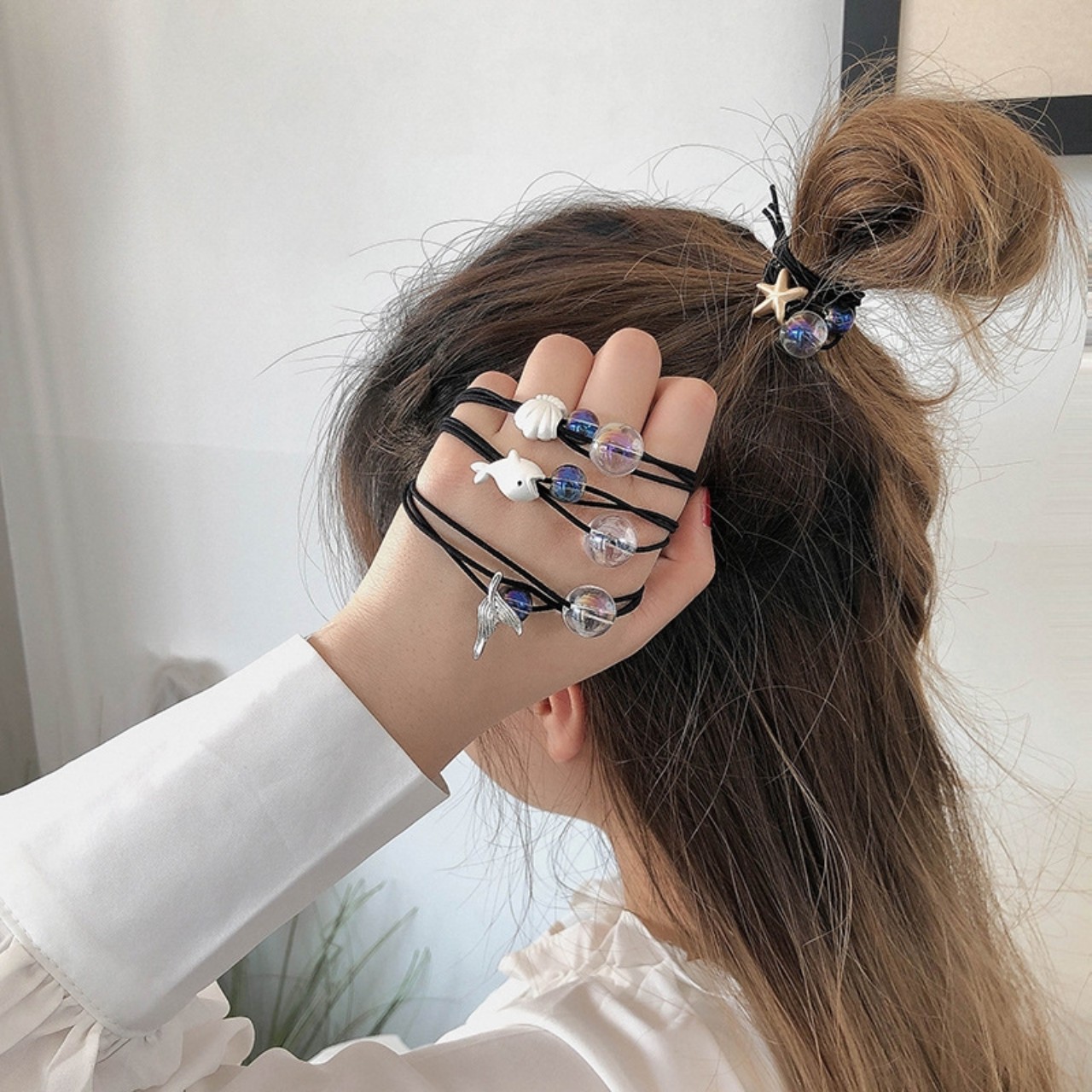 CỘT TÓC ĐẠI DƯƠNG THỦY TINH