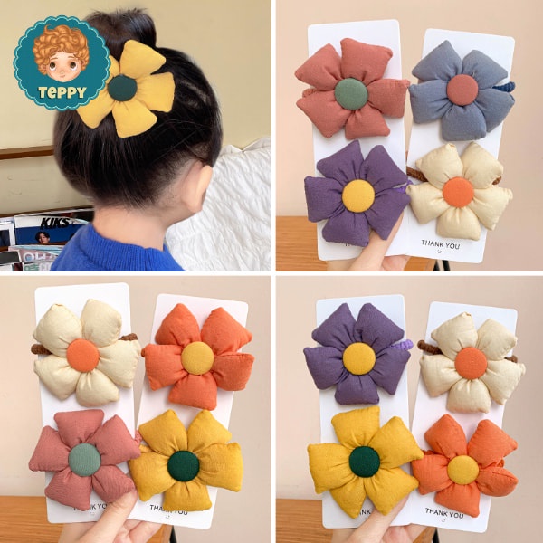 Cột tóc, búi tóc cho bé gái hình bông hoa