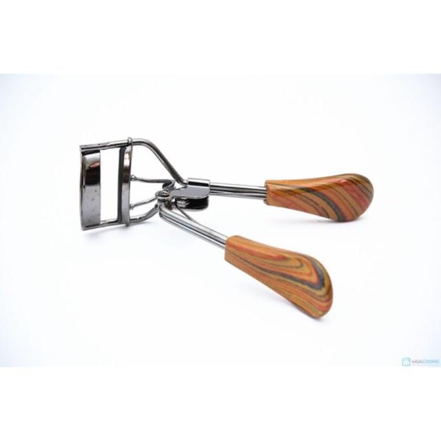Bấm mi gỗ tặng kèm 01 miếng đệm