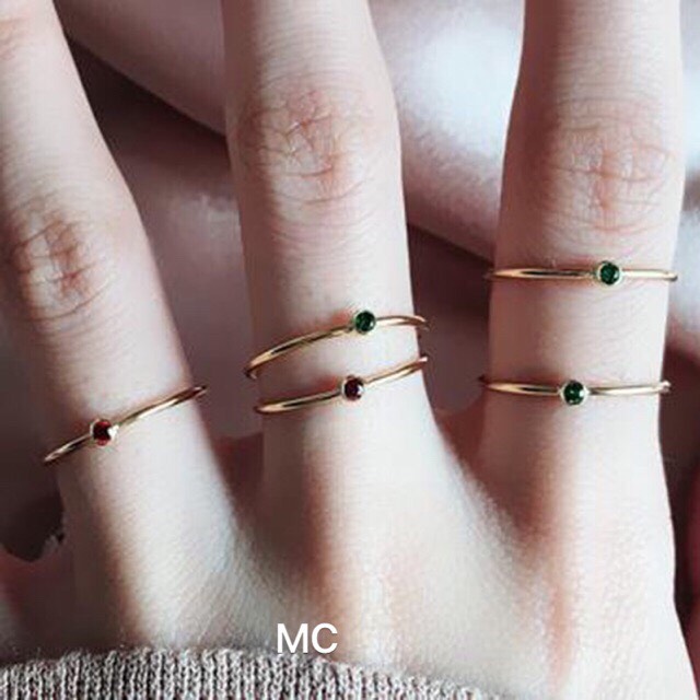nhẫn nữ ổ đá nhỏ vàng tây