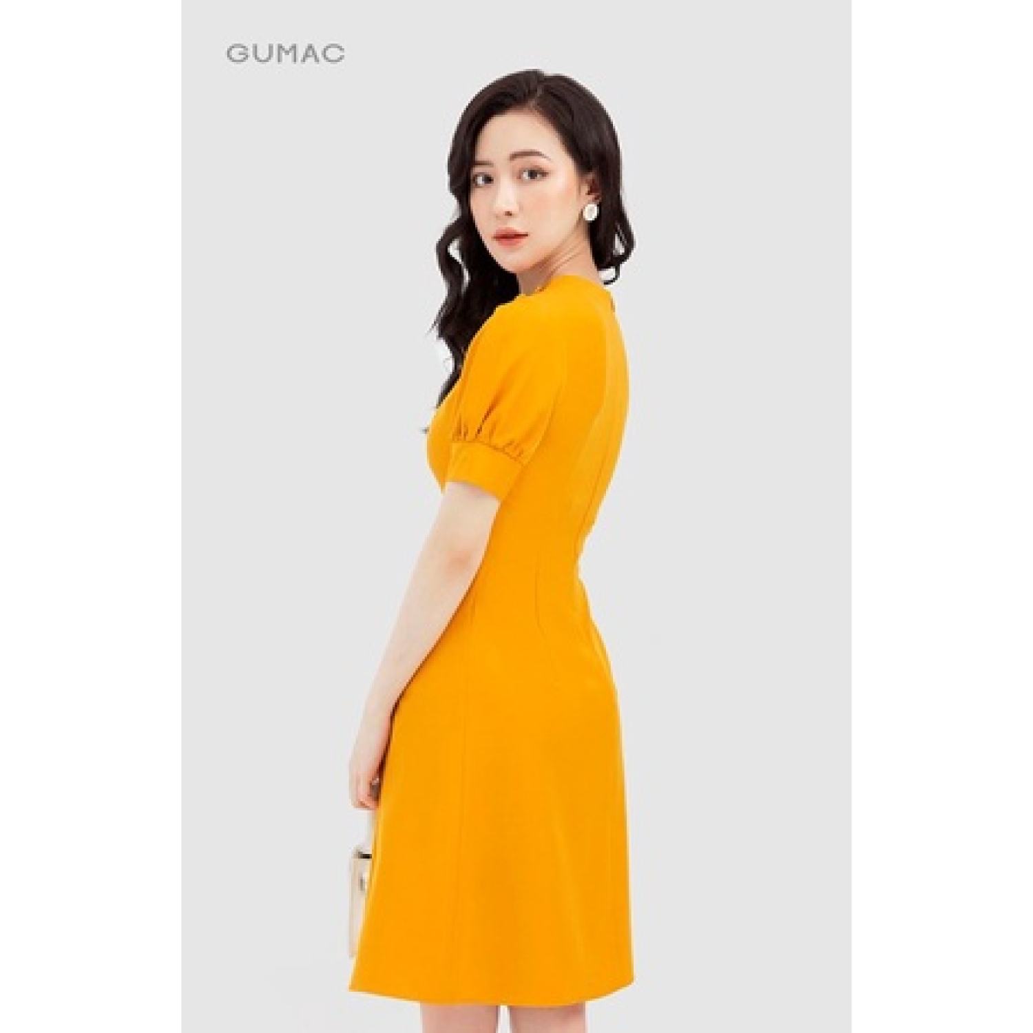 Đầm cổ V phối nút GUMAC