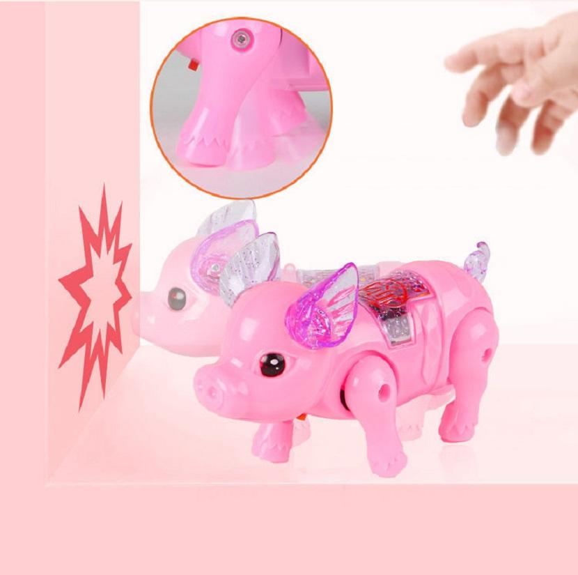 Đồ chơi con heo biết đi có nhạc, đèn, dây dắt
