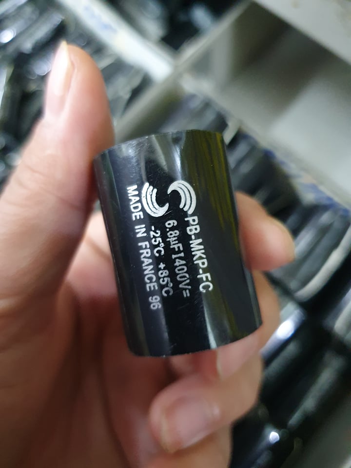 tụ phân tân 6,8uf_400v gia ban 2 con