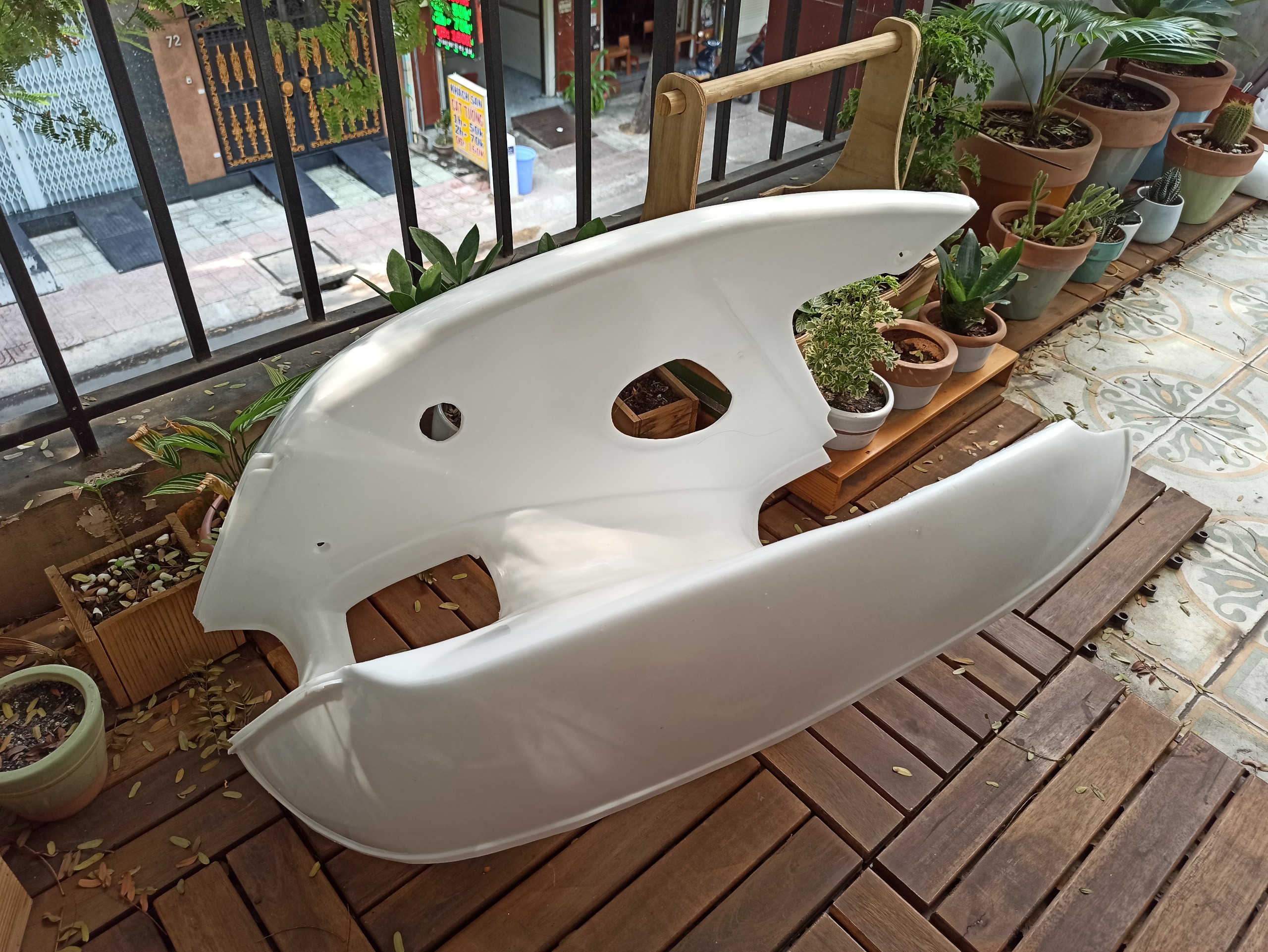 Bửng (yếm) xe cub 80, én đèn tròn